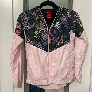 Nike pink and black design zip up light jacket size kids large!
